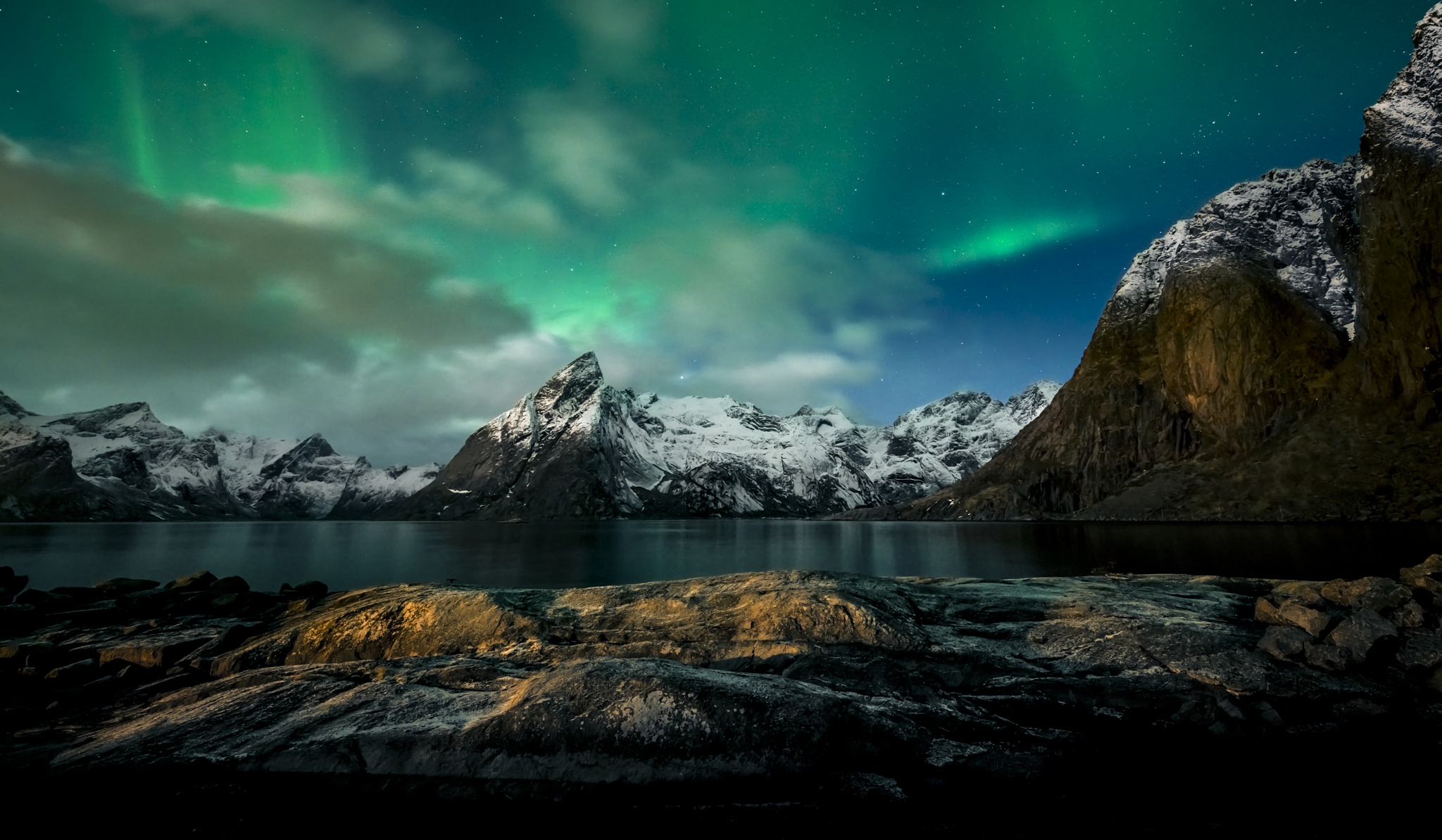Northern Lights over Winter Mountains
