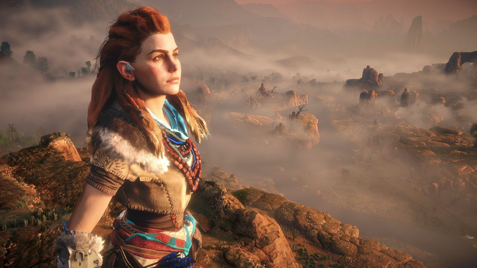 Aloy from the Horizon series gazes out over a misty landscape in this stunning 4K Ultra HD wallpaper from Horizon Zero Dawn, showcasing the game's vibrant visuals.
