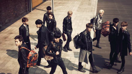 HD desktop wallpaper featuring the members of Exo in stylish outfits walking confidently with a city backdrop.