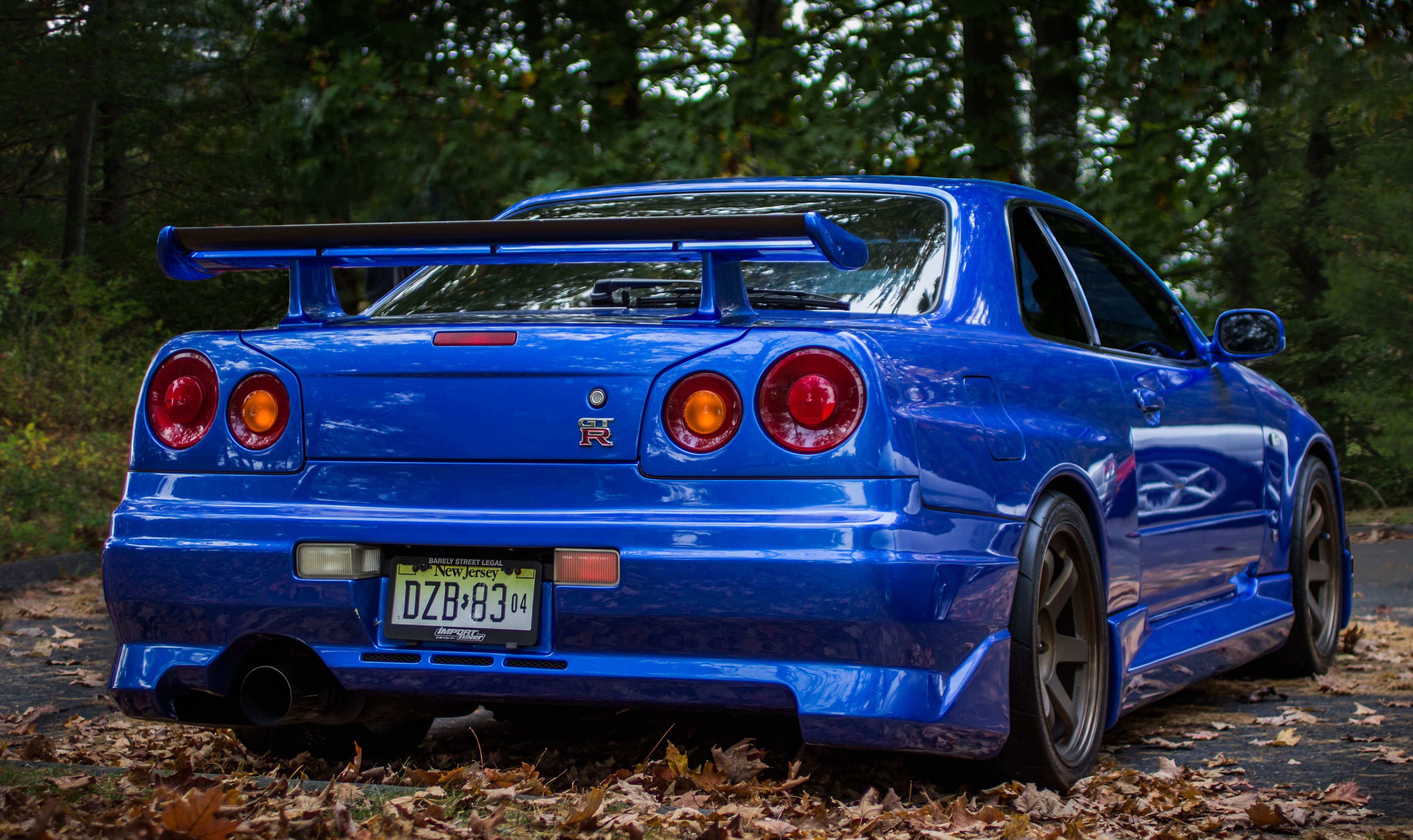 Nissan Skyline Gt R R34 4k Ultra Hd Wallpaper Background Image 4932x2933