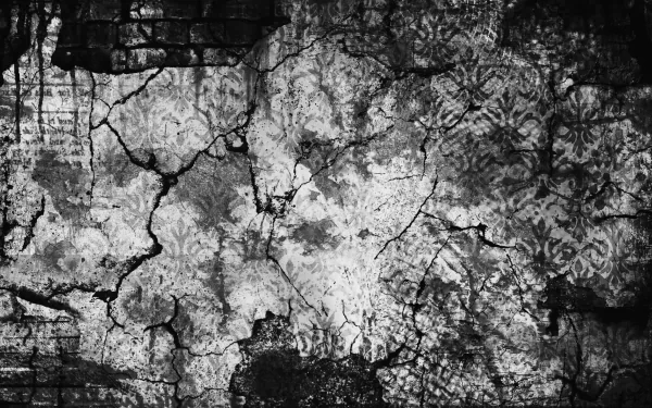 HD PC desktop wallpaper featuring a grey and black abstract grunge texture with cracked and weathered patterns creating a dark, layered background.