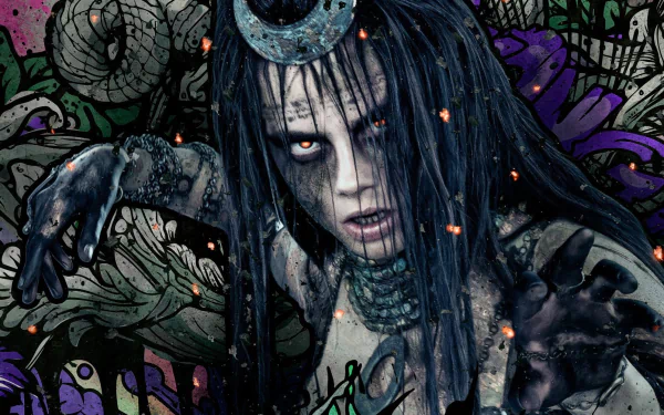 HD wallpaper featuring Cara Delevingne as Enchantress from the movie Suicide Squad. The character is depicted in a dark, mystical setting with an intense, haunting expression.