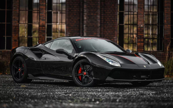 Black Ferrari 488 GTB by Edo Competition, front three-quarter shot with red brake calipers on wet pavement and an industrial brick backdrop — 4K Ultra HD PC desktop wallpaper