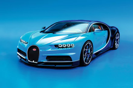 A sleek Bugatti Chiron supercar in a striking blue finish, showcased as a dynamic 4K Ultra HD desktop wallpaper, highlighting its stunning design and performance.
