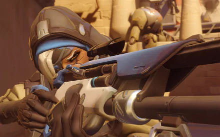 Ana from Overwatch aims her sniper rifle intently in this HD PC desktop wallpaper, showcasing her distinctive character design from the popular video game.
