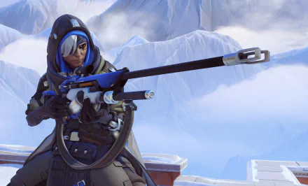 Ana from Overwatch aims her sniper rifle against a snowy backdrop in this vibrant 4K Ultra HD desktop wallpaper showcasing the dynamic visuals of the popular video game.