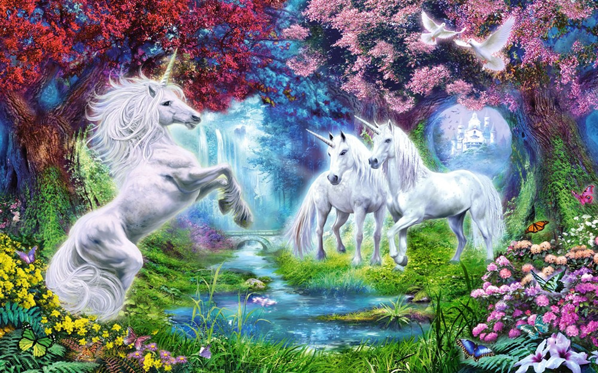 A vibrant fantasy HD PC desktop wallpaper depicting majestic unicorns in a colorful enchanted forest with a glowing castle and butterflies in the background.