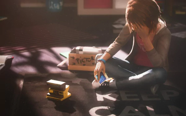Max Caulfield from the video game Life Is Strange sits on the floor, contemplatively looking at a phone, surrounded by personal items and a cozy atmosphere, illustrating her emotional journey.
