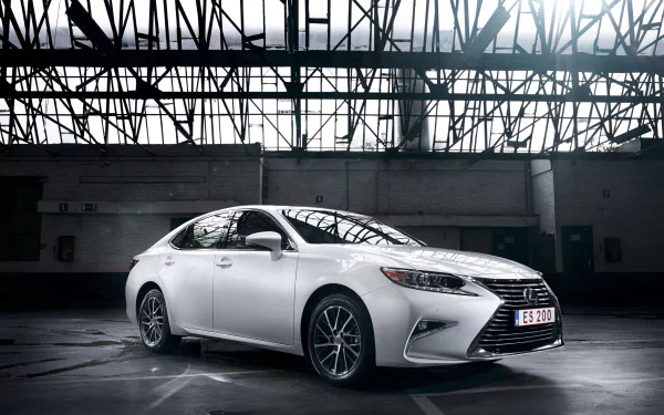 White Lexus ES sedan parked in an industrial warehouse, presented as a 4K Ultra HD PC desktop wallpaper and background.
