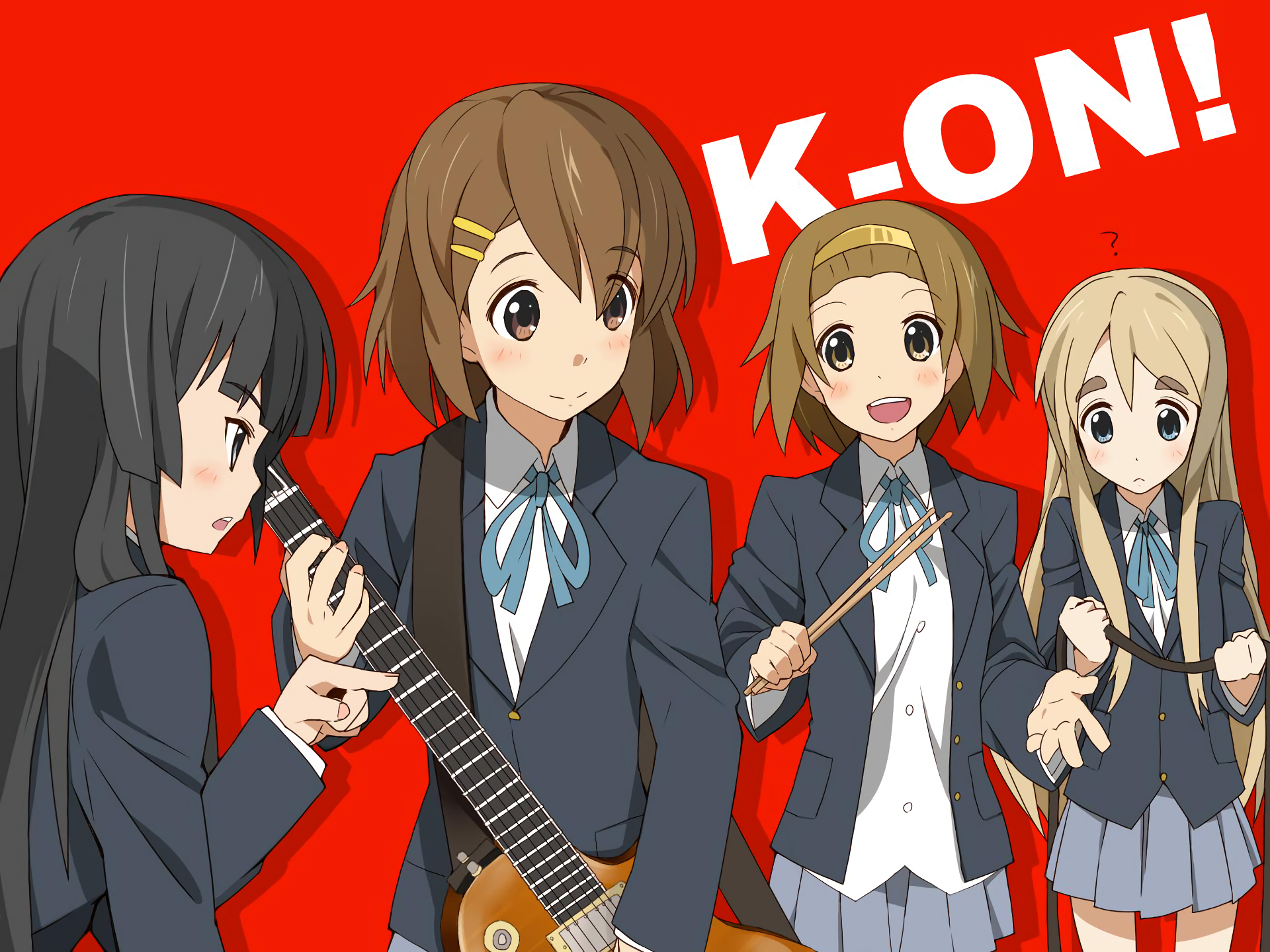 HD PC wallpaper of K-ON! anime band with Yui Hirasawa, Mio Akiyama, Ritsu Tainaka and Tsumugi Kotobuki in school uniforms holding instruments against a red background.