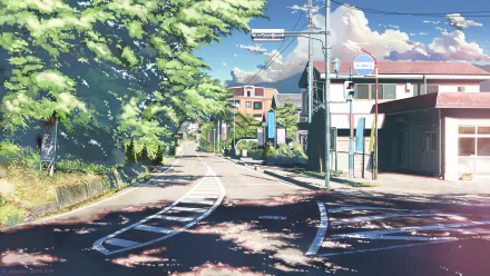 A serene anime scene featuring a quiet street lined with trees and buildings under a blue sky, creating an immersive HD desktop wallpaper and background.