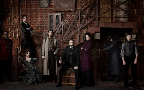 A dramatic ensemble from the TV show Penny Dreadful poses against a rustic, industrial backdrop, showcasing intense characters and moody atmosphere in HD wallpaper format.