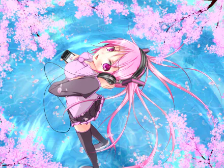 Sakura Miku (Anime Vocaloid) with pink twin-tails and headphones, lying among cherry blossoms above swirling blue water — HD PC desktop wallpaper/background