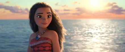 HD desktop wallpaper featuring Moana Waialiki from the movie Moana, looking over the ocean at sunset, with a serene expression and the sun casting warm hues on the water.