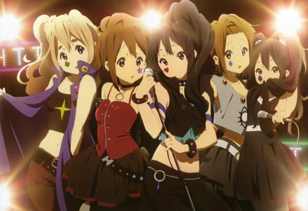 HD desktop wallpaper featuring anime characters Azusa Nakano, Tsumugi Kotobuki, Ritsu Tainaka, Yui Hirasawa, and Mio Akiyama from the series K-ON!, all dressed in gothic-style outfits under stage lights.