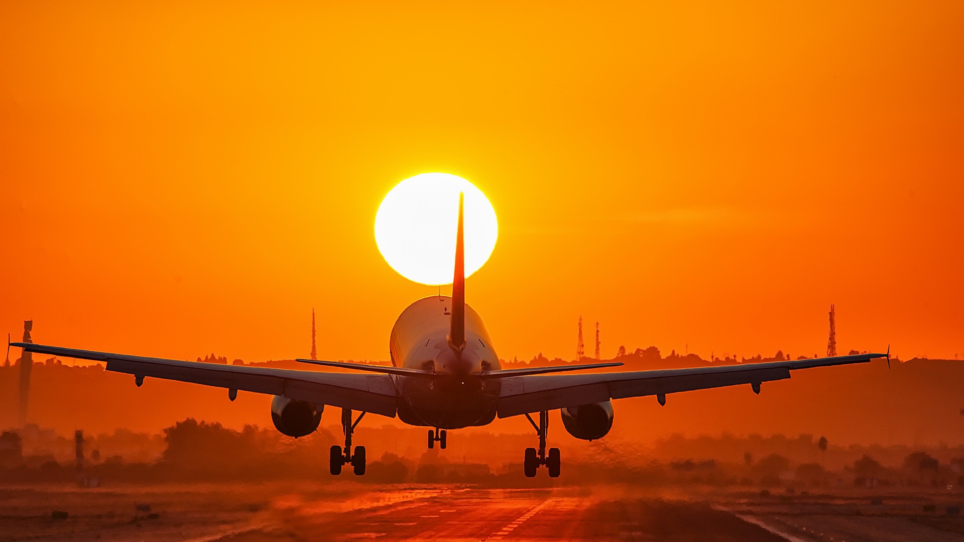 Aircraft Taking Off into the Sunset