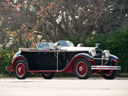 1927 Packard Custom Eight Torpedo Phaeton vintage car in black with red wheels, set against autumn trees, showcased as an HD PC desktop wallpaper and background.