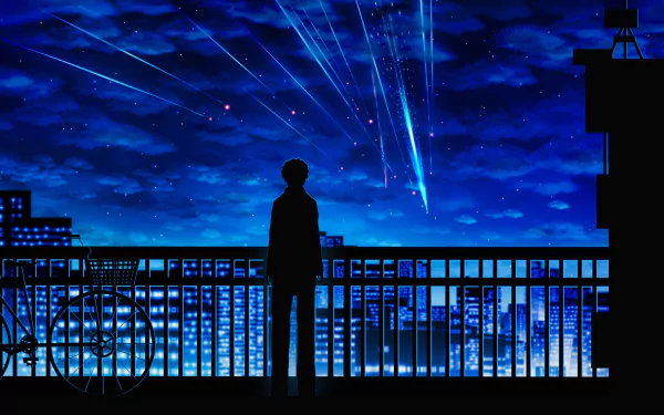 HD desktop wallpaper featuring Taki Tachibana from the anime Your Name, standing on a balcony overlooking a city skyline at night with shooting stars in the sky.