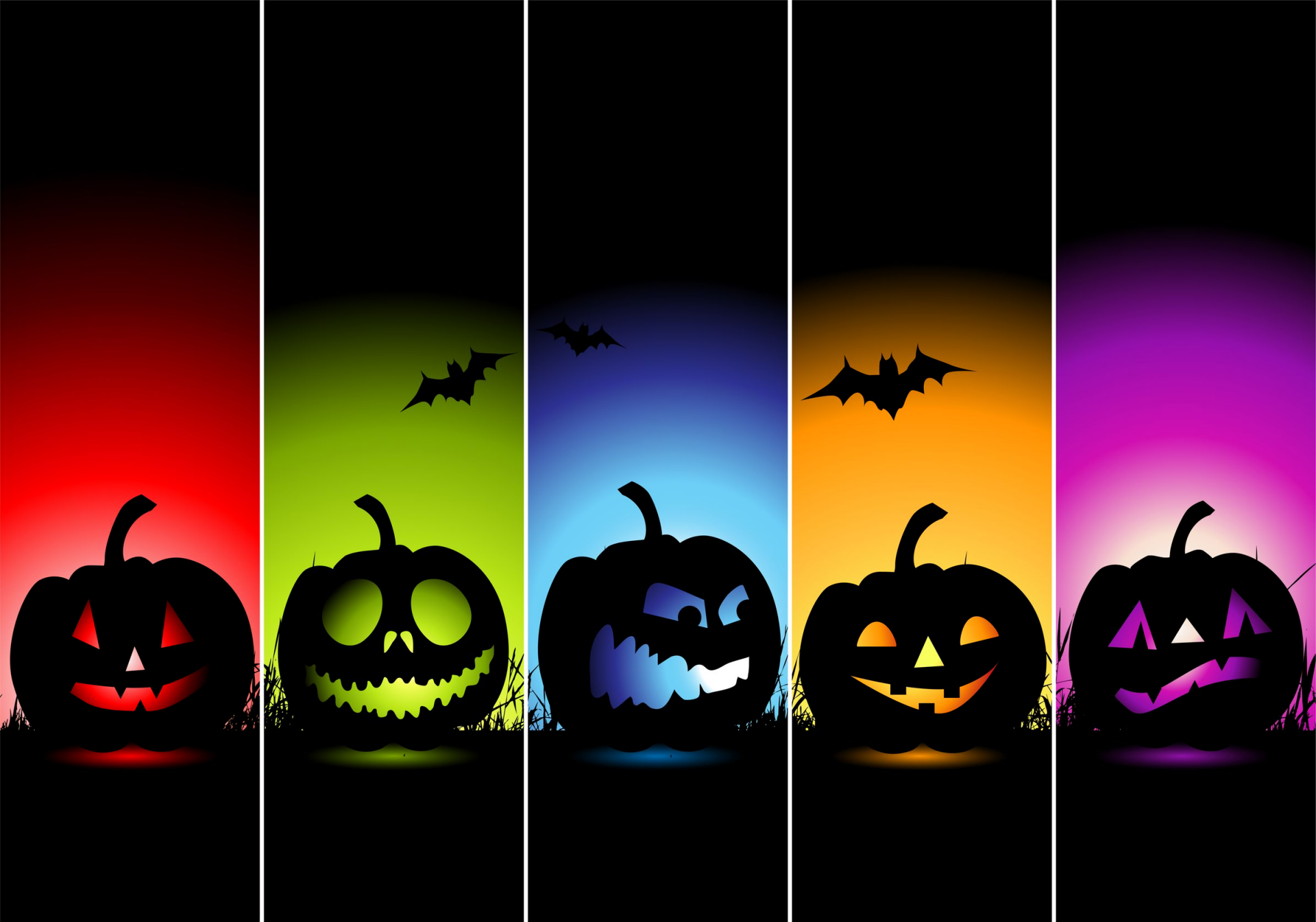 HD PC desktop wallpaper featuring colorful jack-o'-lantern pumpkins with glowing faces and bats, capturing the festive Halloween holiday spirit.
