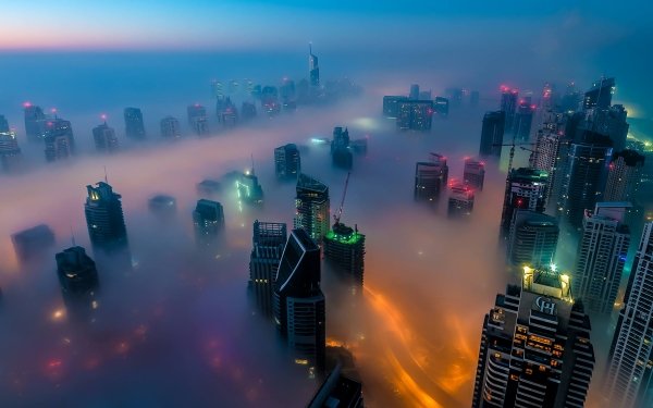 Man Made Dubai Cities United Arab Emirates City Night Fog Building Skyscraper HD Wallpaper | Background Image
