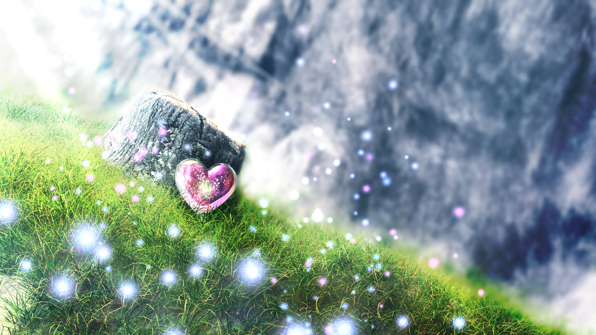 Artistic HD PC desktop wallpaper featuring a glowing pink heart nestled beside a rock on a grassy hill, surrounded by sparkling light orbs symbolizing love.