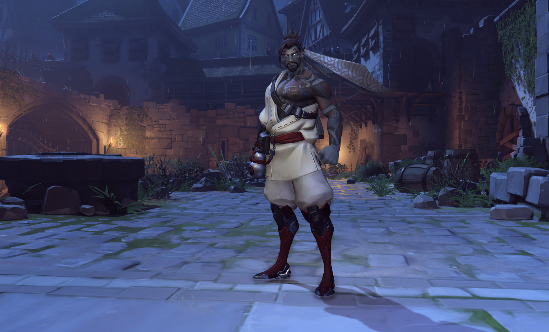 Hanzo from Overwatch stands in a dimly lit, eerie Halloween-themed village, featured in a 4K Ultra HD video game desktop wallpaper background.