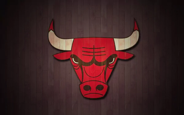 HD PC desktop wallpaper featuring the Chicago Bulls basketball logo with a stylized red bull head against a dark wood background.