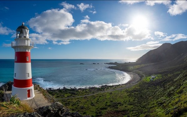 Man Made Lighthouse Coastline Ocean Horizon Sun Sky HD Wallpaper | Background Image