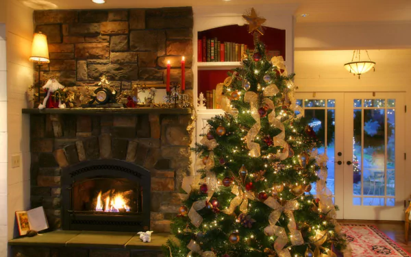 HD PC desktop wallpaper showcasing a cozy holiday scene with a decorated Christmas tree beside a lit fireplace in a warm, festive living room.