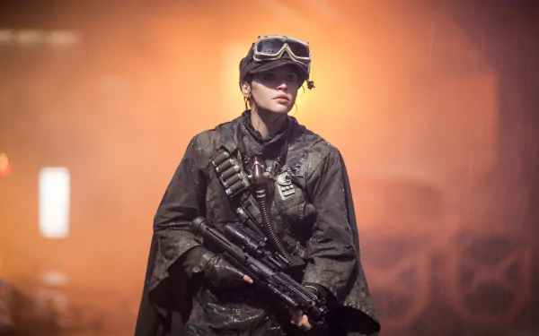 Jyn Erso, portrayed by Felicity Jones, stands in a dramatic scene from Rogue One: A Star Wars Story, showcasing a gritty atmosphere in 4K Ultra HD.