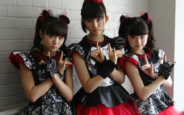 HD PC desktop wallpaper featuring the Japanese metal idol group Babymetal, blending oriental and heavy metal music styles with bold, edgy fashion.