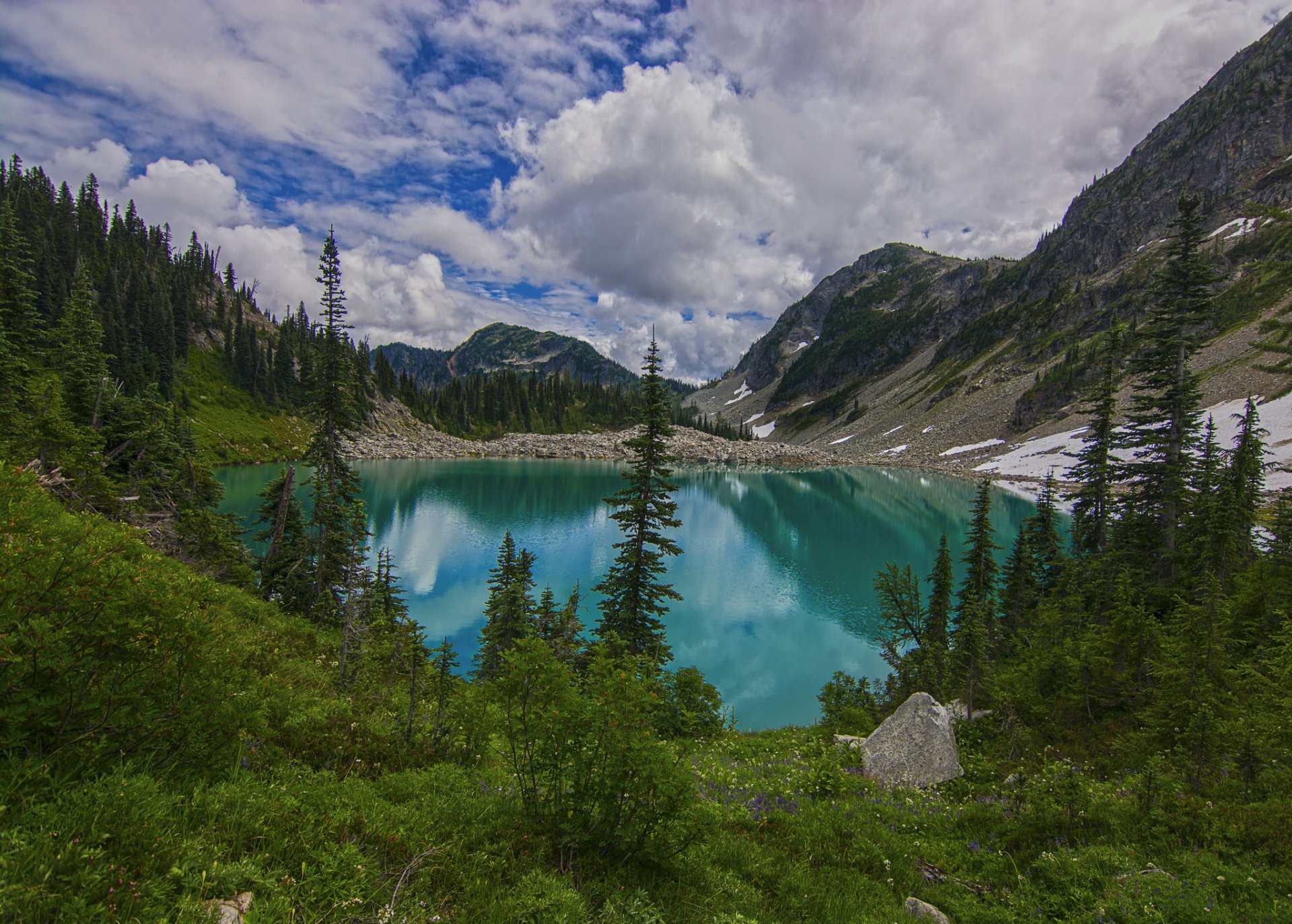 Turquoise Lake in the Mountains