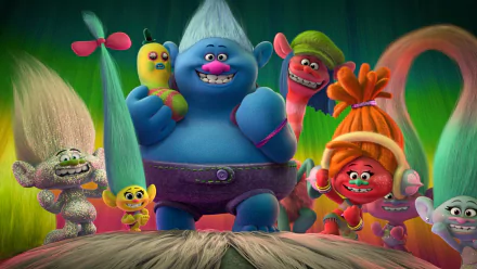 Vibrant HD wallpaper featuring characters from the movie Trolls, showcasing a diverse group of colorful trolls with playful expressions against a whimsical backdrop.