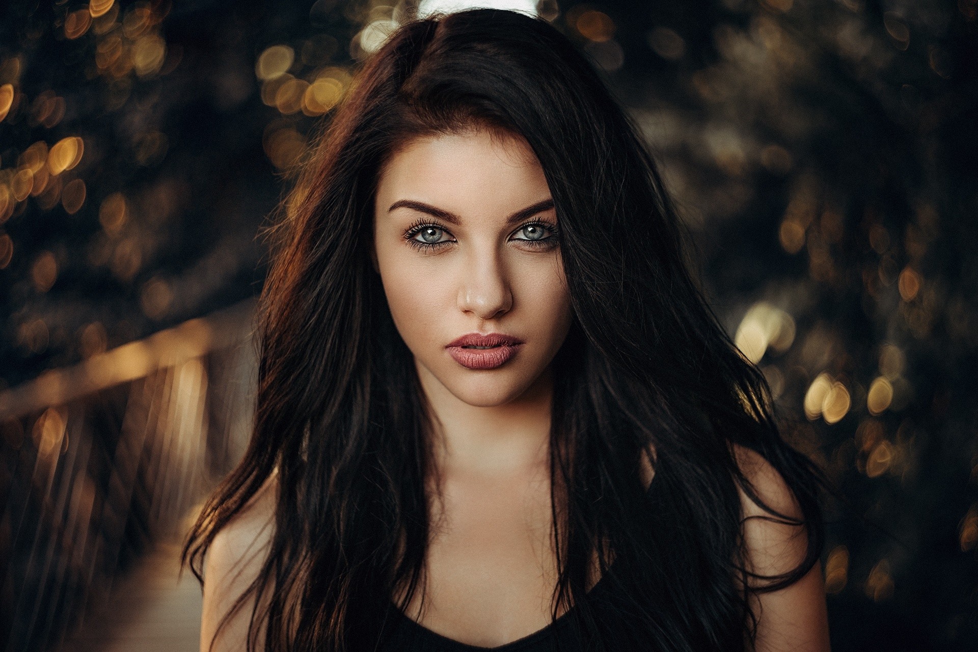 Dark-haired girl with striking blue eyes and freckles - wide 2
