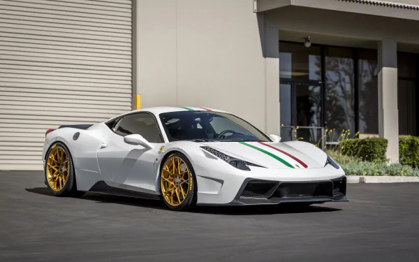 White Ferrari 458 supercar with Italian flag stripes and gold rims parked in front of a modern building, captured in 4K Ultra HD for PC desktop wallpaper.