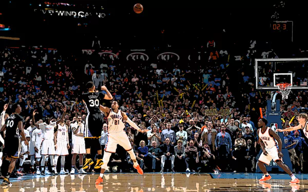 HD wallpaper featuring a basketball player shooting during a game with an excited crowd in the background.