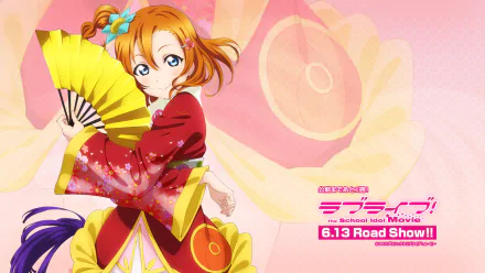 HD desktop wallpaper featuring Honoka Kousaka from the anime Love Live! She is dressed in a traditional outfit, holding a yellow fan, with vibrant colors and promotional text for the movie release.