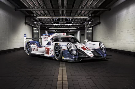 Toyota TS040 Hybrid race car in a dim garage, presented as a 4K Ultra HD PC desktop wallpaper and background highlighting the endurance-racing vehicle.