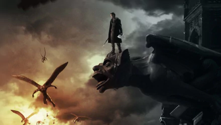 HD PC desktop wallpaper featuring a dramatic scene from the movie I, Frankenstein, with a figure standing on a gargoyle against a stormy sky and flying creatures.