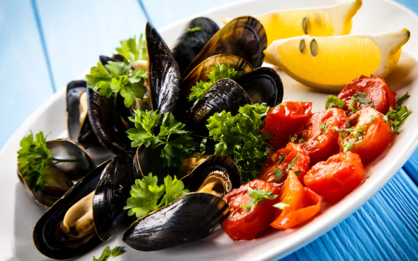 Close-up of mussels with cherry tomatoes and parsley on a white plate—a vibrant tomato seafood dish, 5K Ultra HD PC desktop wallpaper and background.