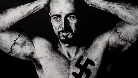 HD PC desktop wallpaper featuring a black and white image from the movie American History X, showing a muscular man with a swastika tattoo on his chest.