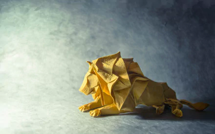 Origami lion crafted from paper, displayed as an HD PC desktop wallpaper and background with a textured gradient backdrop.