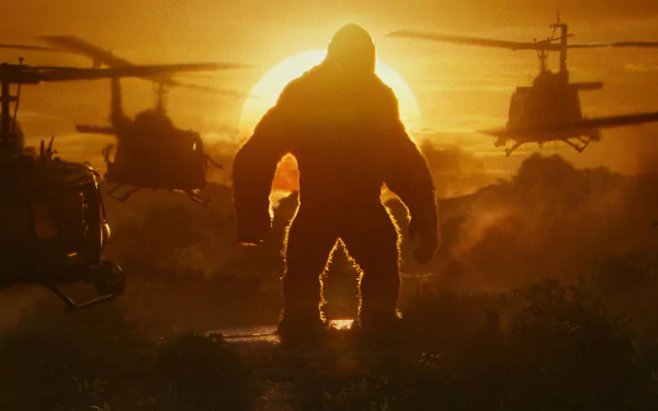 HD desktop wallpaper from Kong: Skull Island featuring Kong standing against a sunset, surrounded by helicopters.