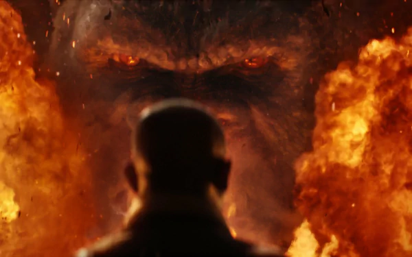 HD PC desktop wallpaper featuring a fiery close-up of Kong’s intense eyes from the movie Kong: Skull Island.