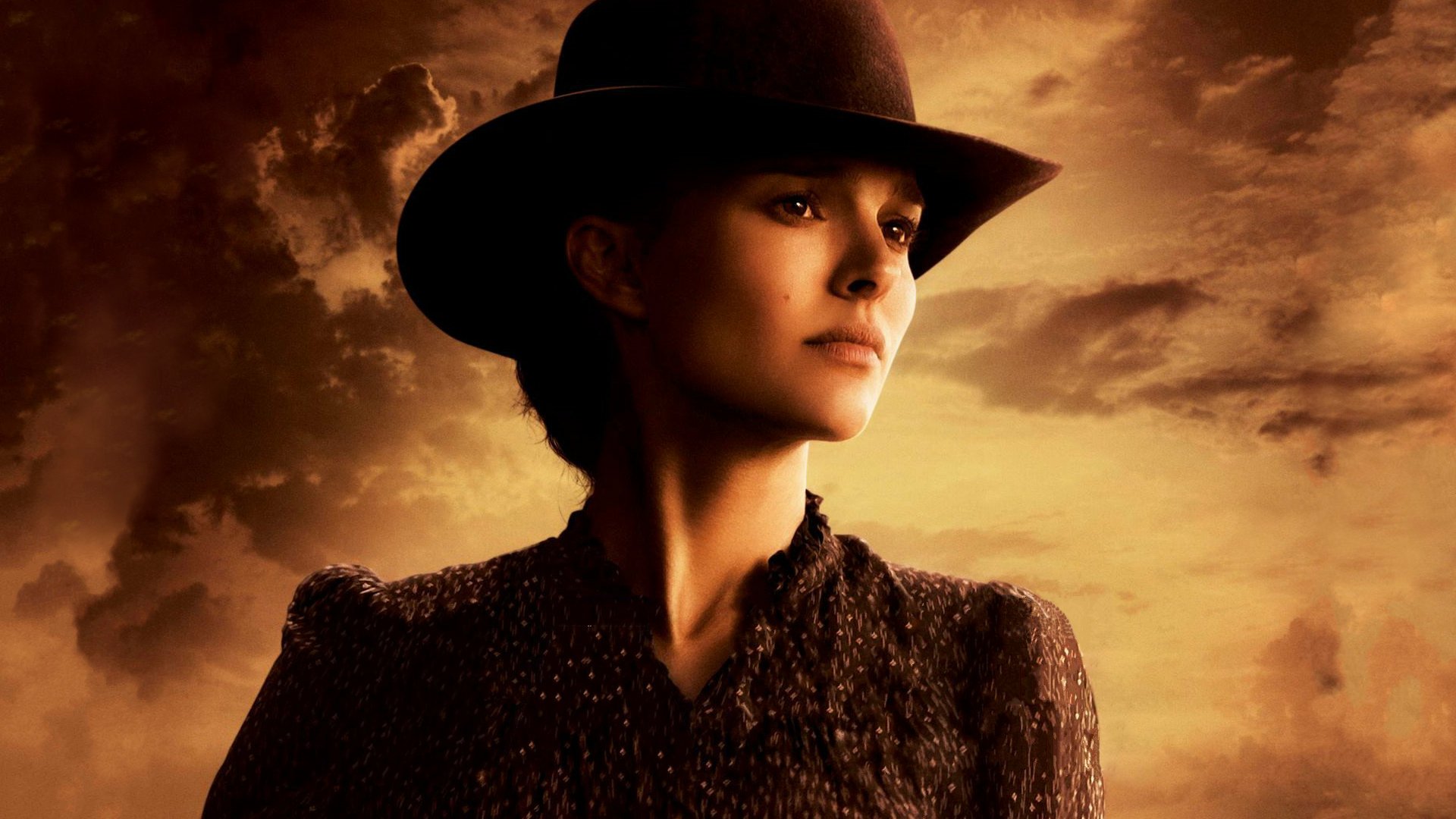 HD PC wallpaper featuring Natalie Portman as Jane in the movie Jane Got a Gun, set against a dramatic, cloudy sky background.