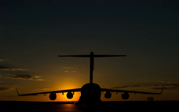  Boeing C-17 Globemaster III Sits on the Parking Ramp Runway Before a Mission by Joseph Swafford