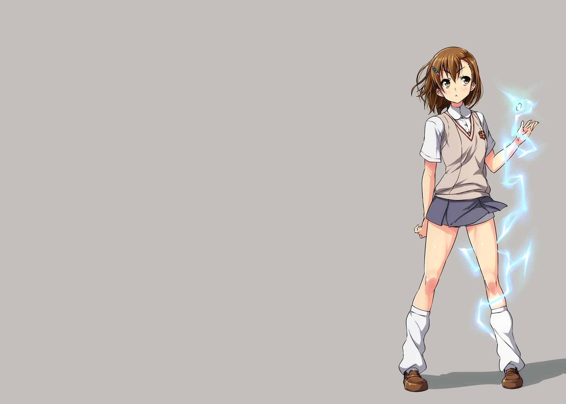 Mikoto Misaka (A Certain Scientific Railgun) in a school uniform skirt, short brown hair and eyes, sparking electricity at her feet — HD desktop wallpaper with gray background.