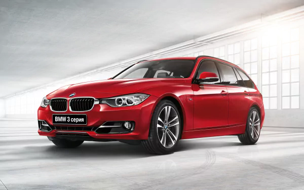 Red BMW 3 Series vehicle showcased in a bright, spacious setting, featured as an HD PC desktop wallpaper and background.