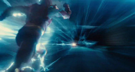 HD desktop wallpaper featuring Ezra Miller as Barry Allen, The Flash, in a dynamic scene from the Justice League movie, showcasing vibrant blue lightning and speed.