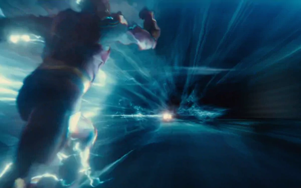 HD desktop wallpaper featuring Ezra Miller as Barry Allen, The Flash, in a dynamic scene from the Justice League movie, showcasing vibrant blue lightning and speed.